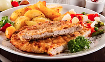 Plato con carne y papas al horno